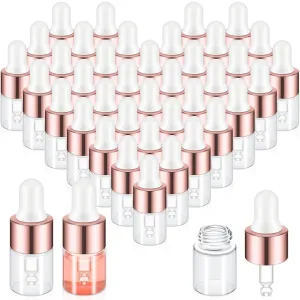 100 Pcs Mini Glass Oil Dropper Bottle Bulk, 2 ml Rose Gold Clear Essential Small Empty Bottles Sample Containers Perfume Liquid Vials with Cap for Traveling