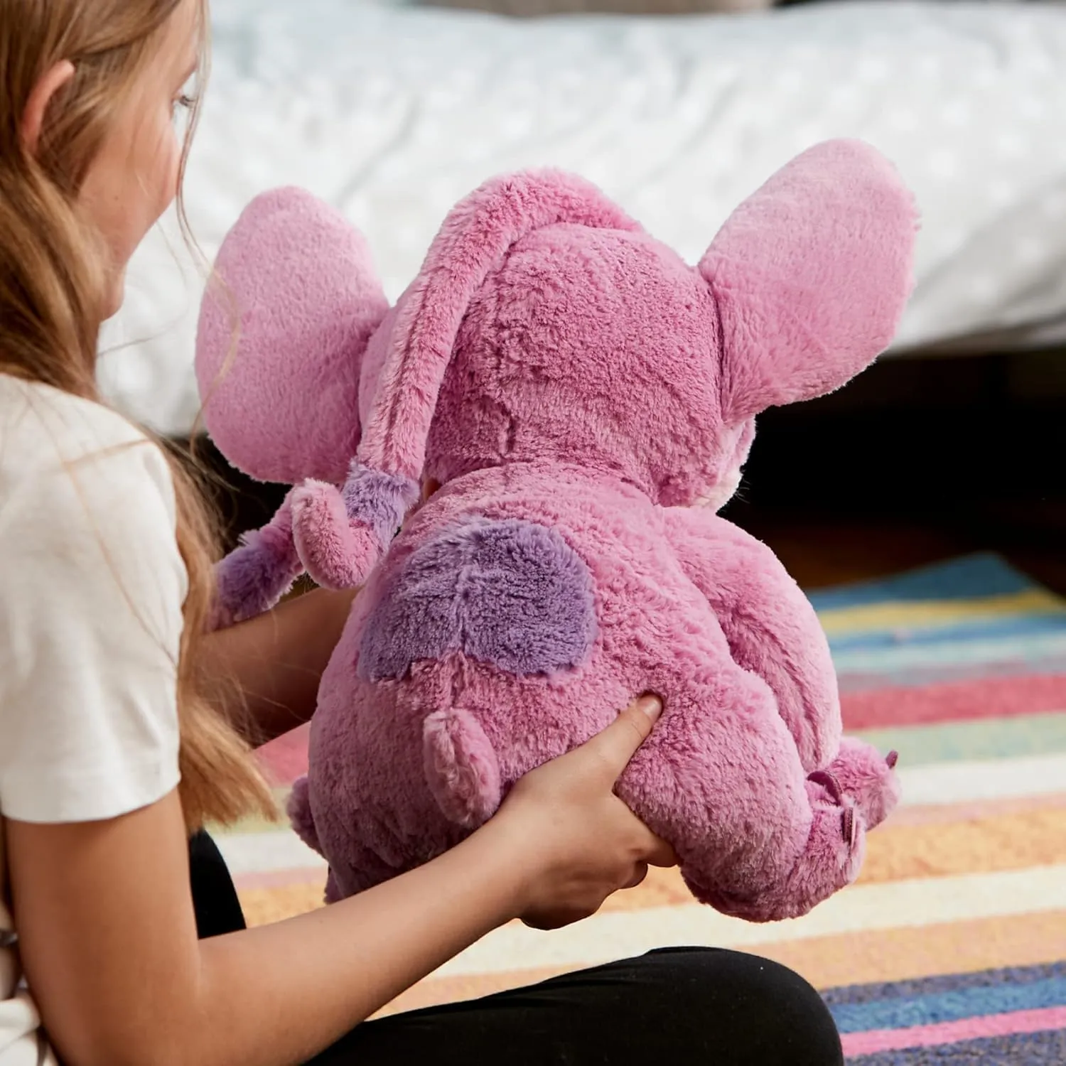 Disney Store Official Angel Medium Soft Toy for Kids, Cuddly Character with Fuzzy Texture and Embroidered Details, Flexible Floppy Ears, Disney Plushy Suitable for All Ages.