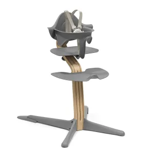 Stokke Nomi High Chair, Grey/Oak - Inspires Active Sitting - Tool-Free, Seamless Adjustability - Includes Baby Set with Removable Harness for Children 6-24 Months